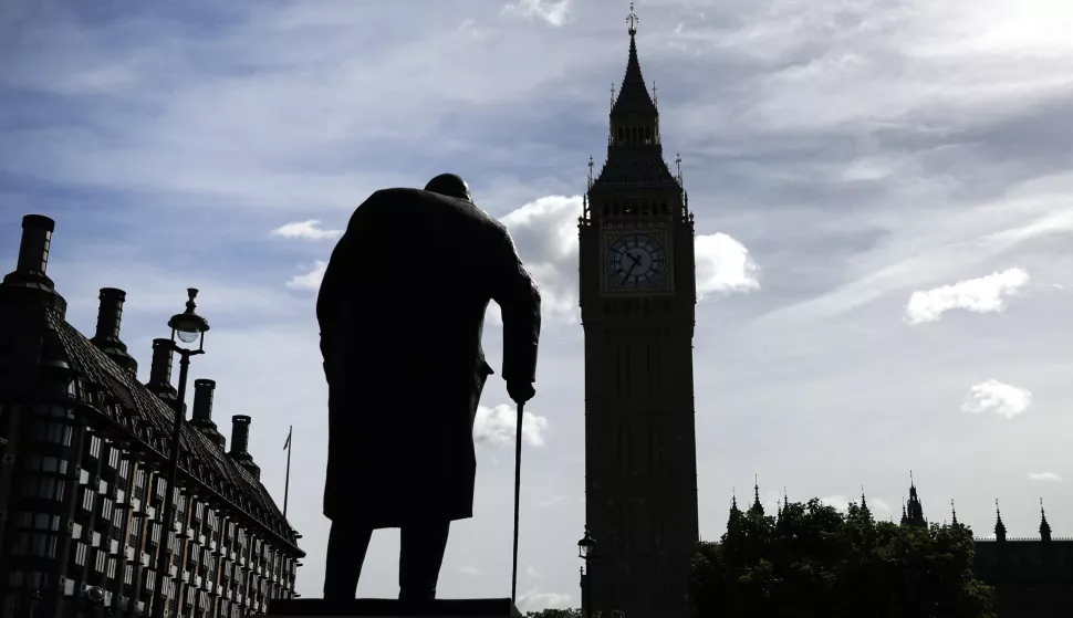 epa11557710 The statue of Winston Churchill stands in front of the Houses of Parliament in Parliament Square, London, Britain, 21 August 2024. The Office for National Statistics (ONS) said that Britain's government borrowing, the difference between public sector spending and income, reached 3.1 billion British pounds in July 2024, 1.8 billion more than a year earlier, which makes it the highest level since 2021. EPA/ANDY RAIN