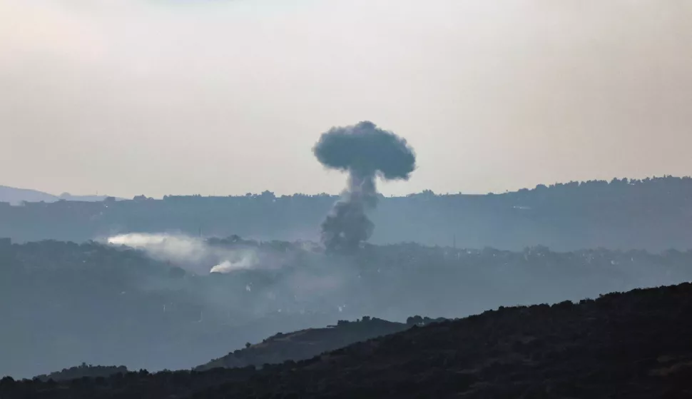 epa11561861 Israeli artillery shells hit an area near the village of Khiam in southern Lebanon, as seen from Upper Galilee, northern Israel, 23 August 2024. The Israeli military stated that a number of projectiles fired from Lebanese territory were identified crossing into northern Israel, with most of the projectiles falling in open areas in the Upper Galilee. EPA/ATEF SAFADI