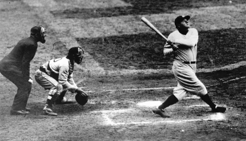 ** FILE ** Babe Ruth of the New York Yankees hits a home run in this undated photo. San Francisco Giants' Barry Bonds has always shown a knack for hitting his most special home runs at home. Now, he will try to move past Babe Ruth's 714 home run record in the sparkling waterfront ballpark he knows best. (AP Photo)