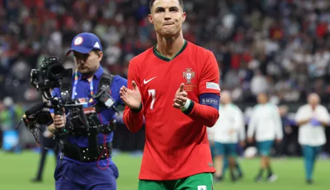 epa11451437 Cristiano Ronaldo of Portugal celebrate winning the penalty shoot-out after the UEFA EURO 2024 Round of 16 soccer match between Portugal and Slovenia, in Frankfurt Main, Germany, 01 July 2024. EPA/MOHAMED MESSARA