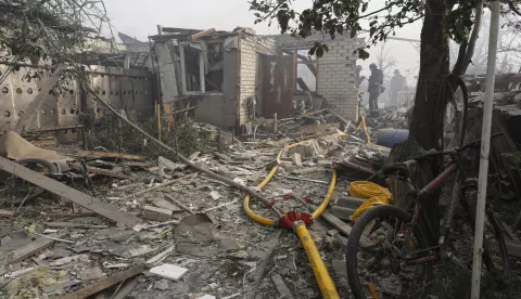 epa11575775 Ukrainian rescuers work at the site of a missile strike on a private building in Cherkaska Lozova, Kharkiv region, northeastern Ukraine, 31 August 2024, amid the Russian invasion. At least two women have been killed and 10 other people, including two children, injured after a Russian missile strike hit Kharkiv's area, the head of the Kharkiv Military Administration Oleg Synegubov wrote on telegram. Russian troops entered Ukrainian territory on 24 February 2022, starting a conflict that has provoked destruction and a humanitarian crisis. EPA/SERGEY KOZLOV