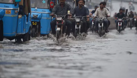 epa11278190 People ride motorcycles during heavy rain in Karachi, Pakistan, 14 April 2024. At least 29 people have died and another seven have been injured in the last two days due to lightning strikes and incidents related to the heavy rains affecting several provinces of Pakistan, rescue officials said. In total, 17 people died in the northeastern province of Punjab, in addition to eight deaths in southern Balochistan and four in northern Khyber Pakhtunkhwa. EPA/SHAHZAIB AKBER