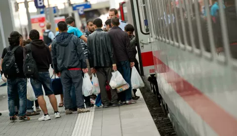 Refugees board a special train service for Dortmund at the central station in Munich,?Germany, 13 September 2015. Photo: Sven Hoppe/dpa/DPA/PIXSELL