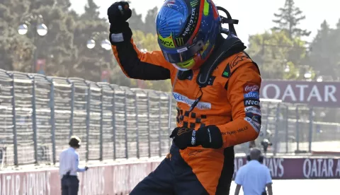 epa11605580 Australian driver Oscar Piastri of McLaren F1 Team celebrates after winning the 2024 Formula One Grand Prix of Azerbaijan, at the Baku City Circuit in Baku, Azerbaijan, 15 September 2024. EPA/YURI KOCHETKOV