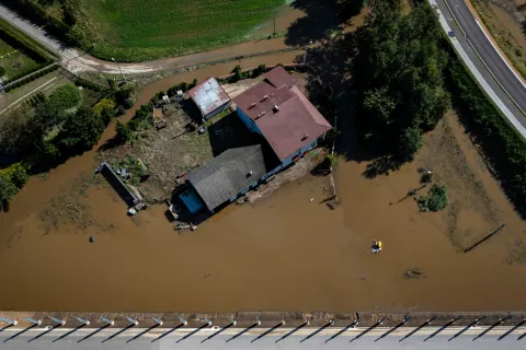 epa11605401 An aerial picture taken with a drone shows the flooded Jawiszowice village, southern Poland, 15 September 2024. The next 24-36 hours will be crucial for the southern regions of Poland experiencing record downpours. On 14 September, the Institute of Meteorology and Water Management (IMGW) reported that the water level exceeded the alarm condition at 41 hydrological stations and the warning condition at 30 stations. EPA/Lukasz Gagulski POLAND OUT