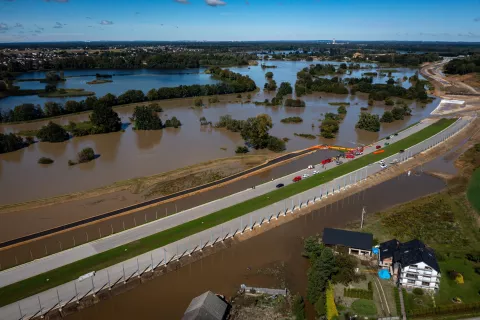 epa11605404 An aerial picture taken with a drone shows the flooded Jawiszowice village, southern Poland, 15 September 2024. The next 24-36 hours will be crucial for the southern regions of Poland experiencing record downpours. On 14 September, the Institute of Meteorology and Water Management (IMGW) reported that the water level exceeded the alarm condition at 41 hydrological stations and the warning condition at 30 stations. EPA/Lukasz Gagulski POLAND OUT