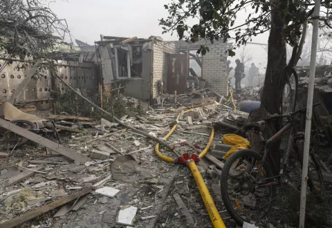 epa11575775 Ukrainian rescuers work at the site of a missile strike on a private building in Cherkaska Lozova, Kharkiv region, northeastern Ukraine, 31 August 2024, amid the Russian invasion. At least two women have been killed and 10 other people, including two children, injured after a Russian missile strike hit Kharkiv's area, the head of the Kharkiv Military Administration Oleg Synegubov wrote on telegram. Russian troops entered Ukrainian territory on 24 February 2022, starting a conflict that has provoked destruction and a humanitarian crisis. EPA/SERGEY KOZLOV