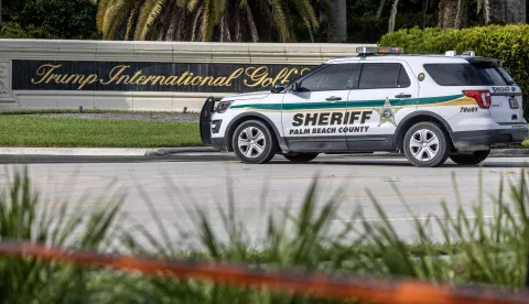 epa11606765 Palm Beach Sheriff officers guard the entrance of the Trump International Golf Club in West Palm Beach, Florida, USA, on 15 September 2024, where gunshots were reported. According to the FBI, they are following an investigation of what appears to be an attempted assassination of Former President Donald Trump. Palm Beach County Sheriff Ric Bradshaw said the US Secret Service agents found a man pointing an AK-style rifle with a scope into the club as Trump was on the course. EPA/CRISTOBAL HERRERA-ULASHKEVICH