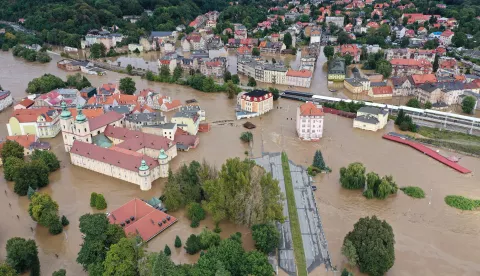 epa11606208 An aerial picture taken with a drone shows flooded Klodzko, southwestern Poland, 15 September 2024. The southern regions of Poland are experiencing record rainfall and severe flooding caused by heavy rains from the Genoese depression "Boris", which reached Poland on Thursday, September 12. People in flooded areas of the region are being forced to evacuate, and water is flooding villages and towns. River levels are at or above alarming levels. Poland's prime minister confirmed on September 15 that one person had died as a result of the flooding. EPA/MACIEJ KULCZYNSKI POLAND OUT