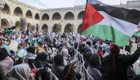 epa07193047 Palestinians women wave a flag as she attends an open day with the first generation of Palestinian refugees in Lebanon on the occasion of the International Day of Solidarity with the Palestinian People in Sidon, Lebanon, 27 November 2018. The first generation of Palestinian refugees since the Nakba gathered in Sidon two days ahead of the International Day of Solidarity with the Palestinian People, which is held on 29 November to mark the anniversary of Resolution 181. EPA/Nabil Mounzer