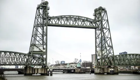 epa09727009 The Koningshaven Bridge, popularly called De Hef, in Rotterdam, Netherlands, 04 February 2022. The bridge hit the headlines amid talks about dismantling its middle part in summer 2022 to allow for the passage of a superyacht built for Amazon's founder Jeff Bezos. EPA/Remko de Waal