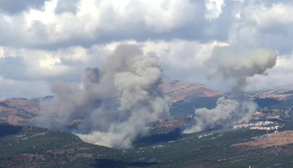 epa11617468 Smoke billows from the site of an Israeli airstrike that targeted southern Lebanese area, as seen fron Marjaayoun, southern Lebanon, 21 September 2024. The Israeli Defense Forces (IDF) said on 21 September they are 'striking targets belonging to the Hezbollah' in Lebanon. The strikes came one day after at least thirty-one people, including Hezbollah commander Ibrahim Akil, were killed and dozens injured in an attack which targeted the southern suburb of Beirut on 20 September, according to the Lebanese Ministry of Health. EPA/STR