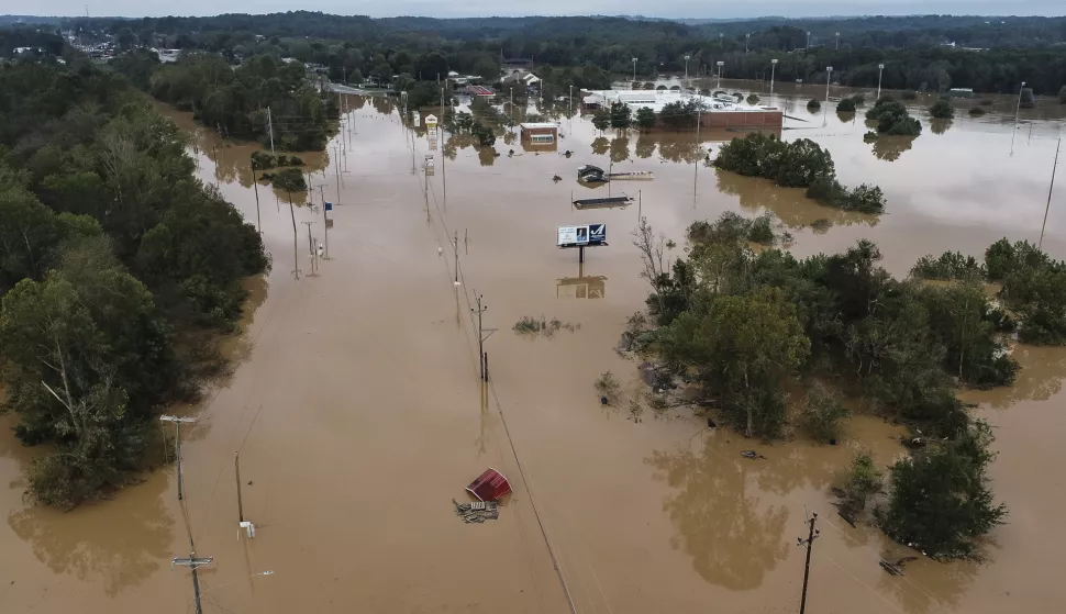 epa11632574 A handout photo made available by the North Carolina Division of Aviation showing an aerial view of flood damage caused by the storm that started as Hurricane Helene in Silver Creek, North Carolina, USA, 29 September 2024. Many parts of the southeastern portion of the United States, including western North Carolina and Tennessee, have been affected by the heavy rains and wind brought by the storm, which has killed at least 64 people. EPA/NORTH CAROLINA DIVISION OF AVIATION HANDOUT HANDOUT EDITORIAL USE ONLY/NO SALES