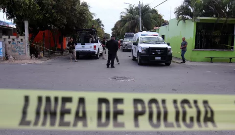 epa07304217 Mexican forensic police members inspect the scene of a deadly shooting in Cancun, Mexico, 20 January 2019. At least 7 people died earlier on the day during a shooting on a private home during a party attended mainly by young people. EPA/Alonso Cupul