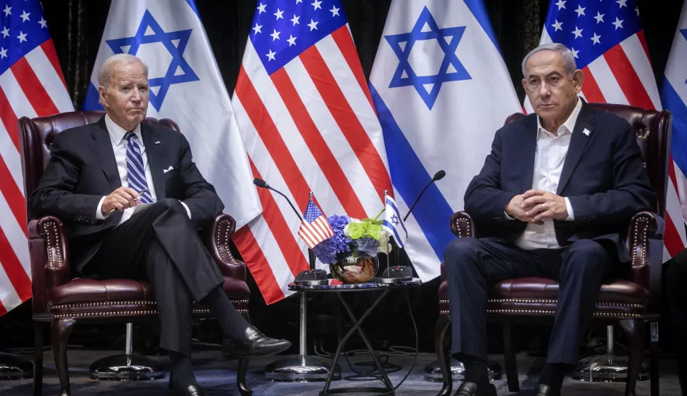 epa10925734 US President Joe Biden (L) looks on during a meeting with Israeli Prime Minister Benjamin Netanyahu (R) in Tel Aviv, Israel, 18 October 2023. President Biden pledged US support for Israel and said the overnight attack on a hospital in the Gaza strip 'appears' to have been caused 'by the other team'. EPA/MIRIAM ALSTER/POOL