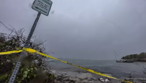 epa11651242 A tilted sign stands at the entrance of the closed Marina Jack as the town prepares for Hurricane Milton in Oyster Bay, Sarasota, Florida, USA, 09 October 2024. According to the National Hurricane Center's Live Hurricane Tracker, Hurricane Milton is set to make landfall on the west coast of Florida on 09 October 9. After rapidly intensifying into a Category 5 storm on 07 October, Milton is anticipated to weaken as it reaches the shore but will still bring significant weather impacts across the state.&nbsp; EPA/CRISTOBAL HERRERA-ULASHKEVICH