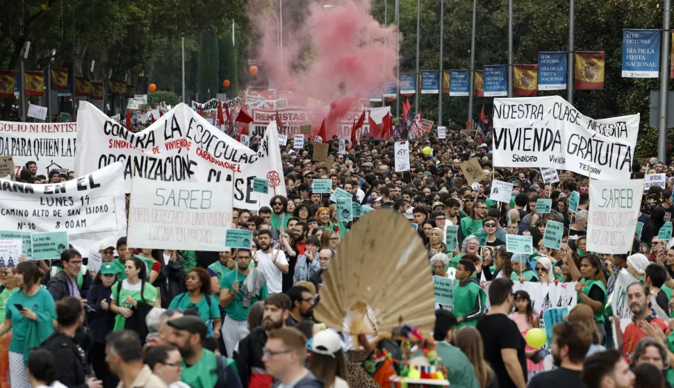 epa11657139 People attend a rally to demand rent price reduction in Madrid, Spain, 13 October 2024. The protest, organized by the Tenant Union and some social groups, is held to get a reduction of 50 percent of rents and promote a 'rent strike' to deny paying rents in a coordinated way. EPA/Chema Moya