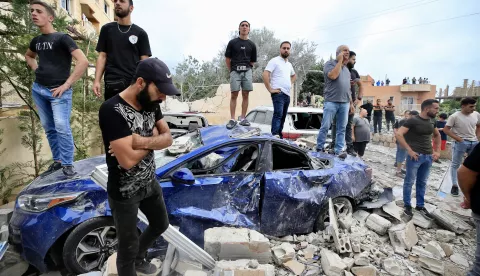 epa11656092 People gather at the site of an Israeli military strike on Barja, south of Beirut, Lebanon, 12 October 2024. According to the Lebanese Health Ministry, at least four people were killed and 14 others injured in the Israeli strike on Barja as rescuers continued to work at the site. More than 2,200 people have been killed and over 10,500 others have been injured in Lebanon since the beginning of the Israeli-Hezbollah conflict, the Health Ministry stated. EPA/STRINGER