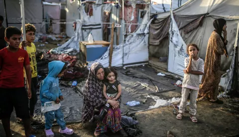 epa11657926 Palestinians inspect destroyed makeshift tents at a camp for internally displaced people on the premises of al-Aqsa Hospital, after the area was hit by an Israeli air strike, in Deir al Balah, central Gaza Strip, 14 October 2024. According to the Palestinian Ministry of Health, four people were killed as a result of the strike on al-Asqa hospital, and several dozens were wounded. More than 42,200 Palestinians and over 1,400 Israelis have been killed, according to the Palestinian Health Ministry and the Israel Defense Forces (IDF), since Hamas militants launched an attack against Israel from the Gaza Strip on 07 October 2023, and the Israeli operations in Gaza and the West Bank which followed it. EPA/MOHAMMED SABER