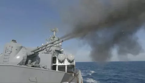 epa09768521 A handout still image taken from handout video made available by the Russian Defence Ministry press service shows Russian cruiser Moskva of the Black Sea Fleet conducting an artillery battle and destroying a mock enemy submarine in Black Sea near Sevastopol, Crimea, 18 February 2022. Since January 20, a series of major exercises have been taking place on all four fleets of the Russian Navy and the Caspian Flotilla. The Russian Defense Ministry reported that 140 ships and vessels, as well as over 10 thousand military personnel, are participating in them. Six large landing ships are transferred to the Black Sea from the Northern and Baltic Fleets. Two Project 1164 Atlant heavy missile cruiser, Varyag and Marshal Ustinov, are already in the Mediterranean, and a third, Moskva, may join them. Each of them is armed with 16 Vulkan anti-ship missiles. EPA/RUSSIAN DEFENCE MINISTRY PRESS SERVICE HANDOUT HANDOUT EDITORIAL USE ONLY/NO SALES