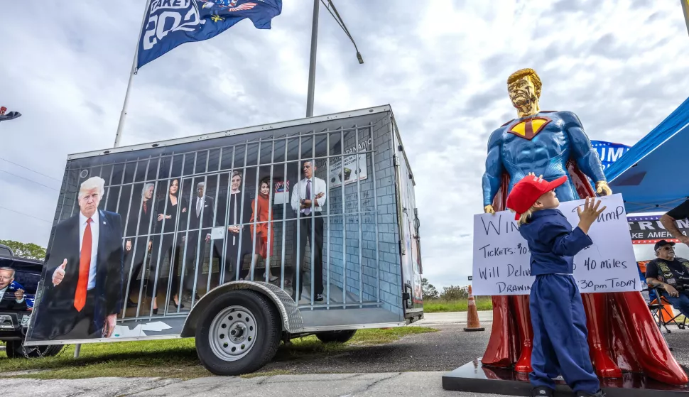 epa11688046 Stetson Hall (2), dressed as the Republican presidential candidate and former US president Donald Trump attends the 'Trump Festival (Take America Back)'' event celebrated in Palmetto, Florida, USA, 27 October 2024. Dozens of supporters of former president Donald Trump attend the Trump Fest, hosted by the local restaurant Peggy's Corral. Trump will face US Vice President and Democratic presidential candidate Kamala Harris in the United States presidential election on 05 November 2024. EPA/CRISTOBAL HERRERA-ULASHKEVICH