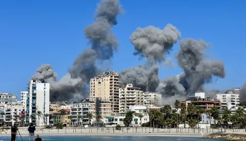 epa11676957 Smoke rises after an Israeli attack on the city of Tyre, Lebanon, 23 October 2024. The Israeli Army, Tsahal, issued warnings to evacuate parts of Tyre it claimed were Hezbollah sites in southern Lebanon ahead of airstrikes. Tyre is a UNESCO World Heritage Site and Lebanon's fifth largest city. EPA/STR