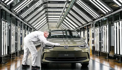 epa10496531 A Volkswagen employee presents redesigned Volkswagen ID.3 car during a press presentation at the Volkswagen Glaeserne Manufaktur (Transparent Factory) in Dresden, Germany, 01 March 2023. Production of redesigned VW ID.3 will start in April 2023. Volkswagen is increasing electric cars sales as company is continuing to the transition to e-mobility. EPA/FILIP SINGER