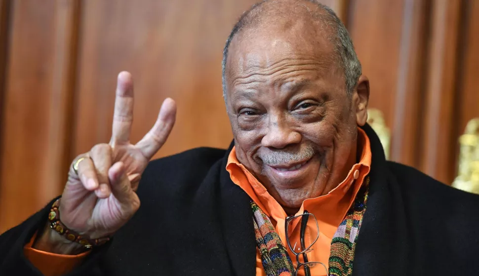 epa06881014 US music producer Quincy Jones makes the victory sign during a press conference on his participation in the 'Umbria Jazz' event, in Rome, Italy, 11 July 2018. On the occasion of Jones' 85th birthday, Umbria Jazz is presenting a show honoring him at the Arena Santa Giuliana in Perugia on 13 July. The festival runs from 13 to 22 July. EPA/ALESSANDRO DI MEO