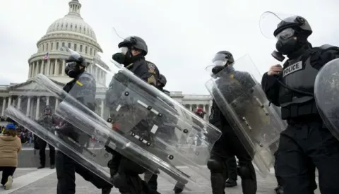 epa08923523 Police respond on the East Front of the US Capitol after Pro-Trump protesters stormed the US Capitol, in Washington, DC, USA, 06 January 2021. Right-wing conservative groups are protesting against Congress counting the electoral college votes. Dozens of state and federal judges have shot down challenges to the 2020 presidential election, finding the accusations of fraud to be without merit. EPA/MICHAEL REYNOLDS