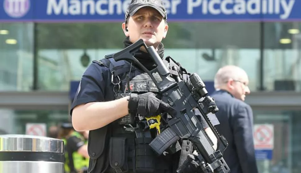 epa05983562 Armed police on patrol in central Manchester, Britain, 23 May 2017. According to a statement by the Greater Manchester Police, at least 22 people have been confirmed dead and around 59 others were injured, in an explosion at the Manchester Arena on the night of 22 May at the end of a concert by US singer Ariana Grande. Police believe that the explosion, which is being treated as a terrorist incident, was carried out by a single man using an improvised explosive device (IED), who was confirmed dead at the scene. British Prime Minister Theresa May in the meantime had condemned the incident as 'an appalling terrorist attack.' EPA/ANDY RAIN