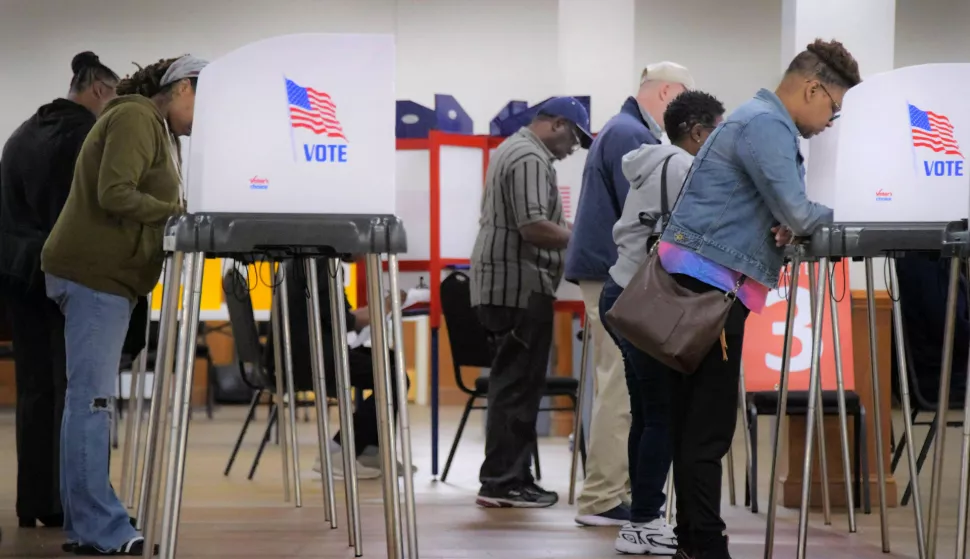 Residents cast their ballots during early voting for the presidential election at Mount Pleasant Ministries near Parkville. (Karl Merton Ferron/Baltimore Sun/TNS) Photo via Newscom Photo: Karl Merton Ferron/NEWSCOM