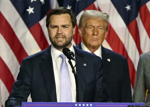 Former United States President Donald Trump listens as Republican VP Nominee JD Vance delivers speaks from the Palm Beach Convention Center at the Trump Campaign Election Night Watch Party in West Palm Beach, Florida on Wednesday, November 6, 2024. Some news outlets have called the race in favor of the former president and others have not yet made a decision. Photo by Joe Marino/UPI Photo via Newscom Photo: Joe Marino/NEWSCOM