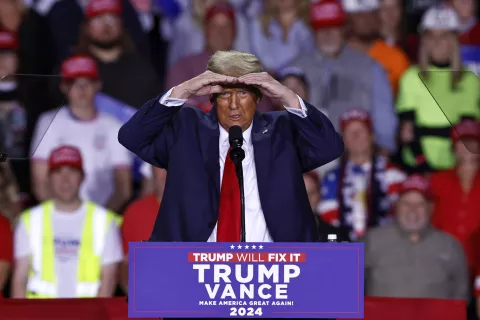 epa11701974 Republican presidential candidate and former US President Donald Trump gestures as he speaks during a campaign rally in Grand Rapids, Michigan, USA, 04 November 2024. Trump and Vice President and Democratic presidential nominee Kamala Harris are tied in the polls with one day until the election of 05 November. EPA/CJ GUNTHER