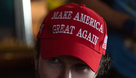 A supporter of the Republican Party wearing a cap with message "Make America Great Again" seen watching the broadcasting of the U.S. election results at the restaurant in Bangkok. Voters across the US cast ballots on 05 November for the 47th President of the United States between Donald J. Trump from the Republican Party and US Vice President Kamala Harris from the Democratic Party. (Photo by Peerapon Boonyakiat/SOPA Images/Sipa USA) Photo: SOPA Images/SIPA USA