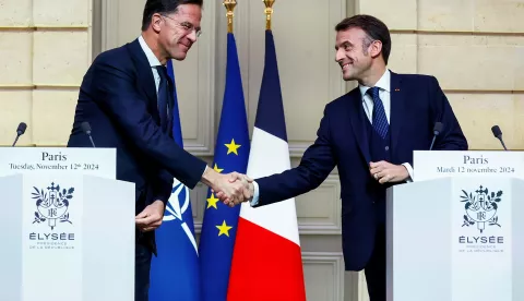 epa11716237 French President Emmanuel Macron (R) and NATO Secretary General Mark Rutte shake hands as they deliver statements during their meeting at the Elysee Palace, in Paris, France, 12 November 2024. EPA/MANON CRUZ/POOL MAXPPP OUT