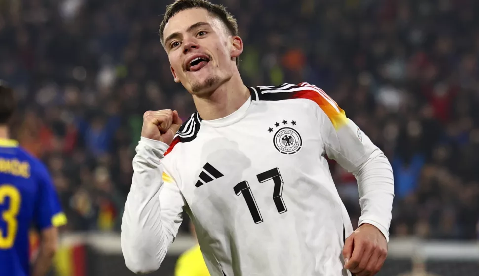 epa11724956 Florian Wirtz of Germany celebrates the 3-0 lead during the UEFA Nations League soccer match between Germany and Bosnia and Herzegovina in Freiburg, Germany, 16 November 2024. EPA/ANNA SZILAGYI