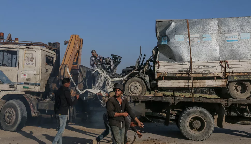 epa11677172 A destroyed truck that was used by workers of the United Nations Relief and Works Agency for Palestine Refugees (UNRWA) is loaded onto another truck after it was hit in an Israeli air strike on Salah Al Dine road between Deir Al Balah and Khan Younis town southern Gaza Strip, 23 October 2024. According to Palestinian officials and the Health Ministry in Gaza, two Palestinian workers of the United Nations Relief and Works Agency for Palestine Refugees (UNRWA) were killed after an Israeli air strike on 23 October. More than 42,600 Palestinians and over 1,400 Israelis have been killed, according to the Palestinian Health Ministry and the Israel Defense Forces (IDF), since Hamas militants launched an attack against Israel from the Gaza Strip on 07 October 2023, and the Israeli operations in Gaza and the West Bank which followed it. EPA/MOHAMMED SABER