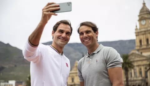 epa10185695 (FILE) - Roger Federer of Switzerland (L) and Rafael Nadal of Spain (R) take a selfie after playing mini tennis on the Cape Town Grand Parade infront of the City Hall and Table Mountain ahead of their exhibition match, South Africa 07 February 2020 (reissued 15 September 2022). Federer on 15 September 2022 released a statement reading that the Laver Cup held on 23-25 September in London will be his final ATP event to compete in. EPA/NIC BOTHMA *** Local Caption *** 55855978