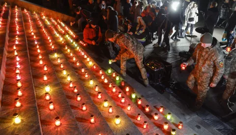 epa11729608 Ukrainians light 1,000 candles to mark 1,000 days since the start of Russia's full-scale invasion of Ukraine, during a joint prayer at the base of the Motherland Monument in Kyiv, Ukraine, 19 November 2024. Russian troops entered Ukrainian territory on 24 February 2022, starting a conflict that has provoked destruction and a humanitarian crisis. EPA/SERGEY DOLZHENKO