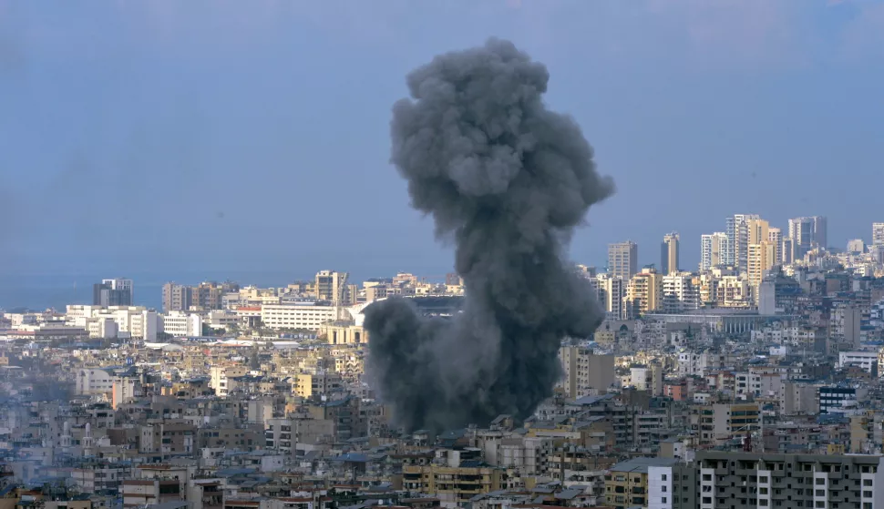 epa11717802 Smoke rises following an Israeli airstrike on the Dahieh district in Beirut, Lebanon, 13 November 2024. The Israeli army on 13 November confirmed that further airstrikes had been carried out overnight in the same area, claiming to have targeted Hezbollah weapons storage facilities. According to the Lebanese Ministry of Health, around 3,300 people have been killed and over 14,200 others have been injured in Lebanon since the escalation in hostilities between Israel and Hezbollah. EPA/WAEL HAMZEH