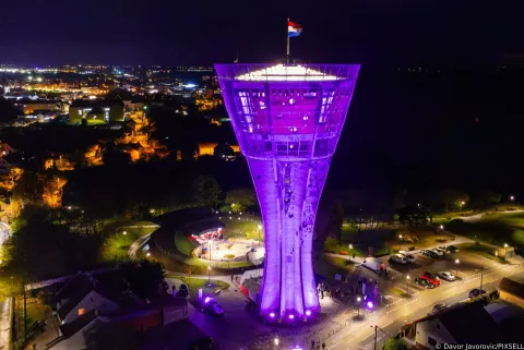 17.11.2023., Vukovar - Pogled iz zraka na Vukovarski vodotoranj osvjetljen ljubicastom bojom povodom Svjetskog dana prijevremeno rodjene djece. Photo: Davor Javorovic/PIXSELL