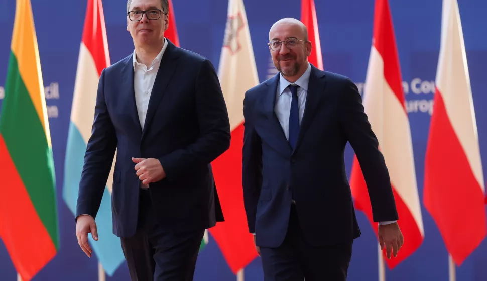 epa11438673 President of Republic of Serbia Aleksandar Vucic (L) is welcomed by European Council President Charles Michel ahead to a meeting in Brussels, Belgium, 26 June 2024. Later this afternoon Serbian Present will meet with Prime Minister of Kosovo Albin Kurti and EU High Representative for Foreign Affairs Josep Borrell for a High-level meeting of the Belgrade-Pristina Dialogue. EPA/OLIVIER HOSLET