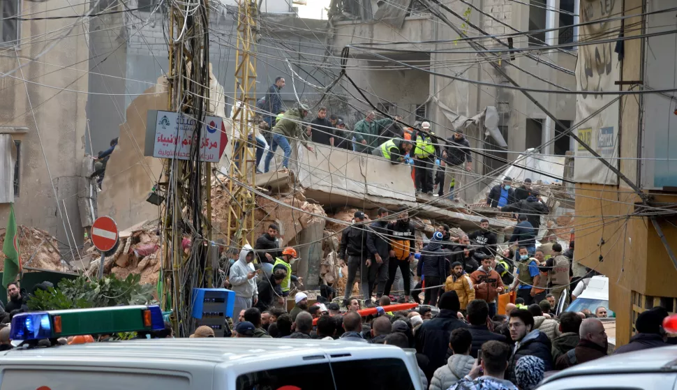 epa11741906 Rescuers search the rubble of a building following an Israeli airstrike on Al-Nuwairi area, Beirut, Lebanon, 26 November 2024. According to the Lebanese Ministry of Health, more than 3,700 people have been killed and more than 15,600 others injured in Lebanon since the escalation in hostilities between Israel and Hezbollah. EPA/WAEL HAMZEH