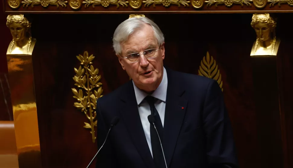 epa11753356 French Prime Minister Michel Barnier delivers a speech as part of the French National Assembly debate on parts of France's 2025 budget bill, in Paris, France, 02 December 2024. Prime Minister Barnier activated Article 49.3 of the Constitution to pass his social security budget bill without a vote, as a majority of members of Parliament rejected his project on 02 December 2024. EPA/MOHAMMED BADRA