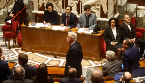 epa11753368 French Prime Minister Michel Barnier (C) attends the French National Assembly debate on parts of France's 2025 budget bill, in Paris, France, 02 December 2024. Prime Minister Barnier activated Article 49.3 of the Constitution to pass his social security budget bill without a vote, as a majority of members of Parliament rejected his project on 02 December 2024. EPA/MOHAMMED BADRA