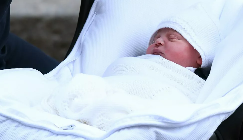 epa06687668 Britain's Prince William, Duke of Cambridge carries his newborn son as they leave the Lindo Wing at St. Mary's Hospital in Paddington, London, Britain, 23 April 2018. The baby boy is the royal couple's third child and fifth in line to the British throne. EPA/ANDY RAIN