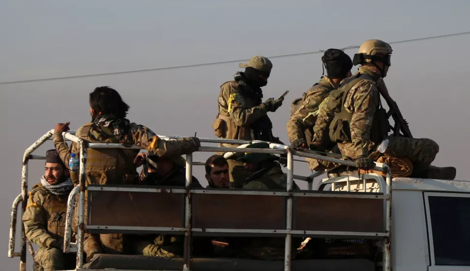 epa11752875 Armed men sit in the back of a truck driving in Aleppo after rebel forces took control of the city, in Aleppo, Syria, 02 December 2024. According to the Syrian Observatory for Human Rights (SOHR) on 30 November, militants opposing the Syrian government, seized Aleppo International Airport. Syrian opposition forces, led by the Islamist militant group Hayat Tahrir al-Sham (HTS) launched an offensive on 27 November, taking large parts of Aleppo, Syria's second-largest city. The offensive triggered counterattacks by the Syrian regime forces as well as Russian and Syrian airstrikes on opposition-controlled areas. More than 400 people, including civilians and militants have been killed since 27 November, SOHR stated, while the United Nations Office for the Coordination of Humanitarian Affairs (OCHA) stated that over 20,000 people have been internally displaced within Aleppo and to other governorates. EPA/BILAL AL HAMMOUD