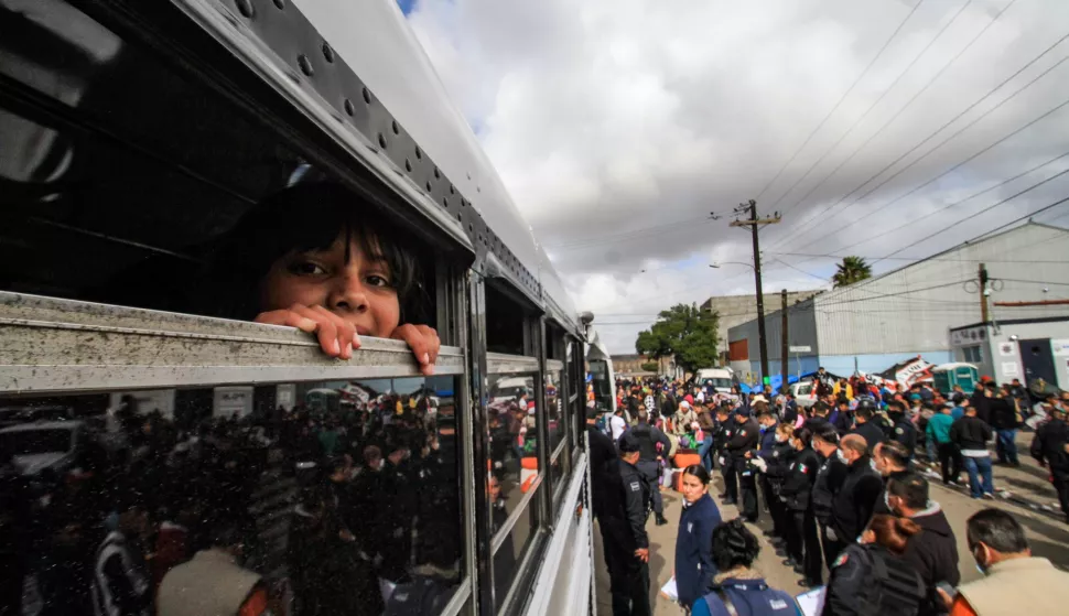 epa07200790 Members of the Central American migrant caravan leave the Benito Juarez sports center due to the intense rains of the last three days in Tijuana, Baja California, Mexico, 30 November 2018. Members of the migrant caravan, with more than 6,000 Central Americans stationed in the border city of Tijuana, were forced to change shelters between protests, and some of the members have gone on a hunger strike in protest of not being granted asylum in the USA. EPA/JOEBETH TERRIQUEZ