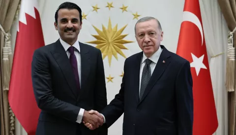 epa11720565 A handout photo made available by the Turkish Presidential Press Office shows Turkish President Recep Tayyip Erdogan (R) and Emir of Qatar Sheikh Tamim bin Hamad Al Thani (L) pose for a photo during their meeting in Ankara, Turkey, 14 November 2024. EPA/TURKISH PRESIDENTIAL PRESS OFFICE/HANDOUT HANDOUT EDITORIAL USE ONLY/NO SALES