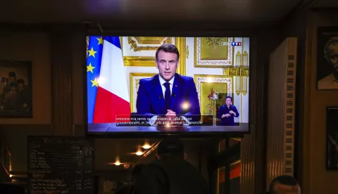 epa11759130 A screen shows the French President Emmanuel Macron delivering a televised speech to the French nation, in Paris, France, 05 December 2024. French President Emmanuel Macron addressed the nation a day after the government of the French Prime Minister Michel Barnier lost a no-confidence vote at the National Assembly. EPA/TERESA SUAREZ